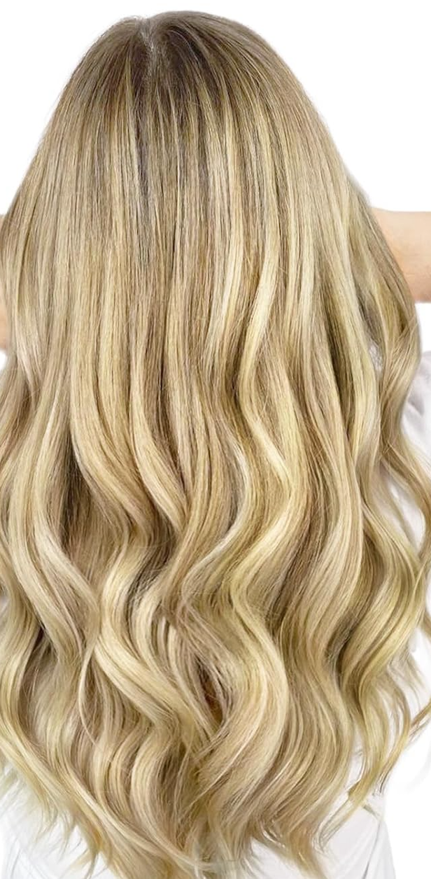 Model wearing Malibu, highlighted with Sunset Blonde (#16/22) invisible clip in