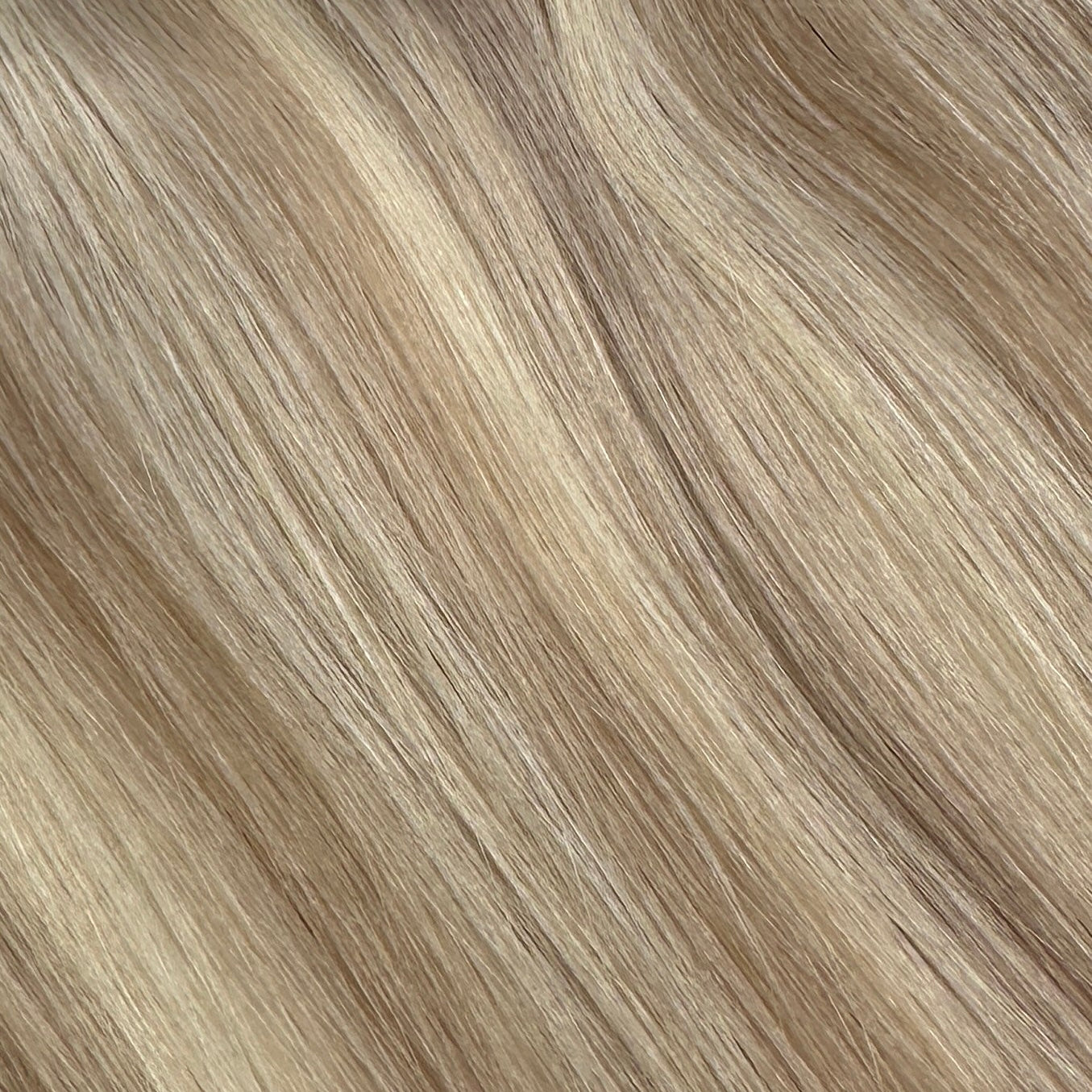 Hair extensions clip in Russian Nova Ash Veil, highlighted with Sunset Blonde #14/22